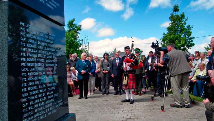 Pictured on June 20th 2015 at the unveiling of the Great War Remembrance Monument at Green Park in Ballina, were (L/R): PJ Clarke, Chairman of the Ballina Comrades of the Great War Committee, Cecile Dejardain, Athis Mons, An Taoiseach Enda Kenny and piper Sean Lavin who played "A Lament for the Dead". Photo: Anthony Hickey